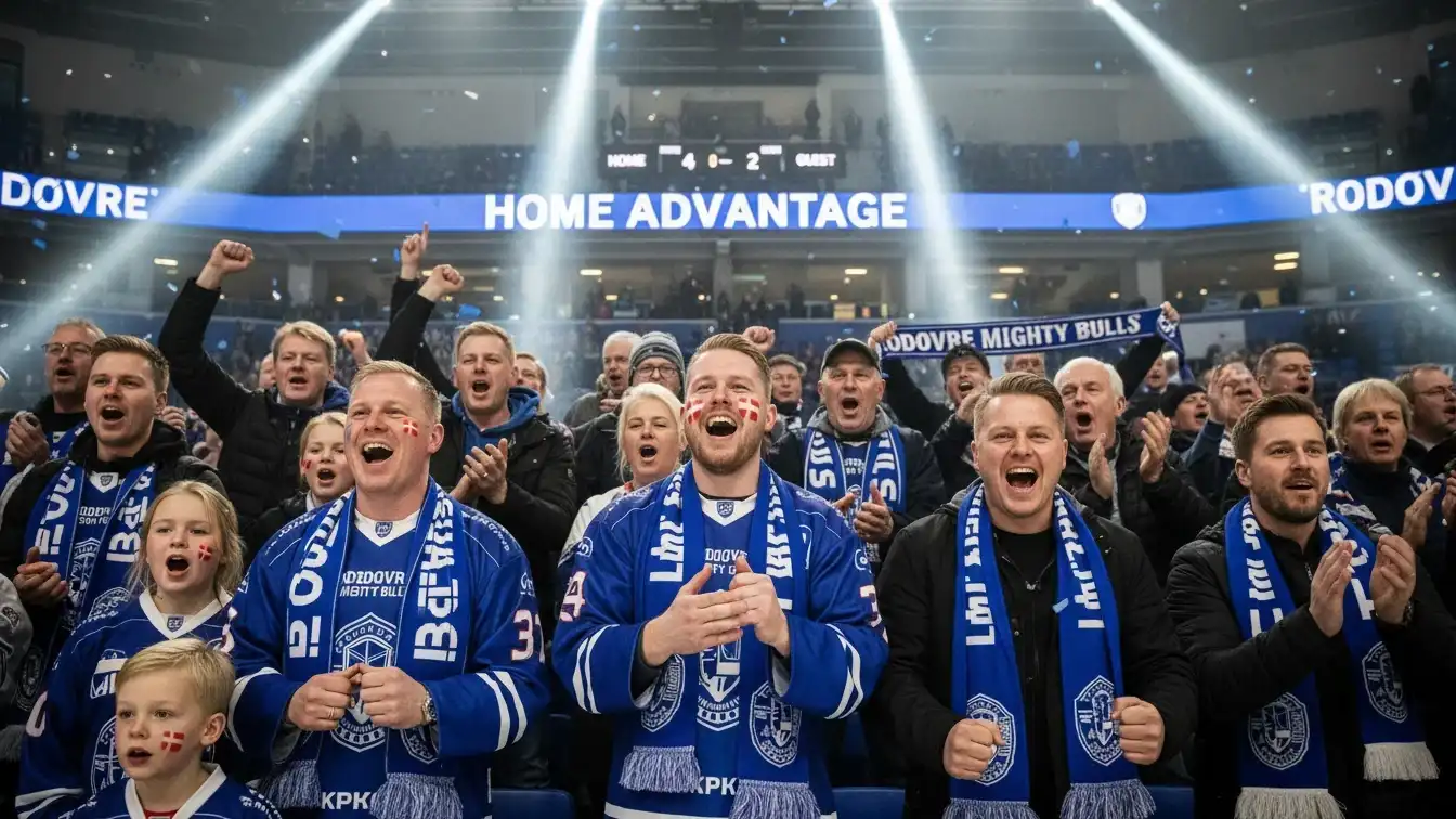 Ishockeyfans der støtter deres hold på hjemmebane i en fyldt arena